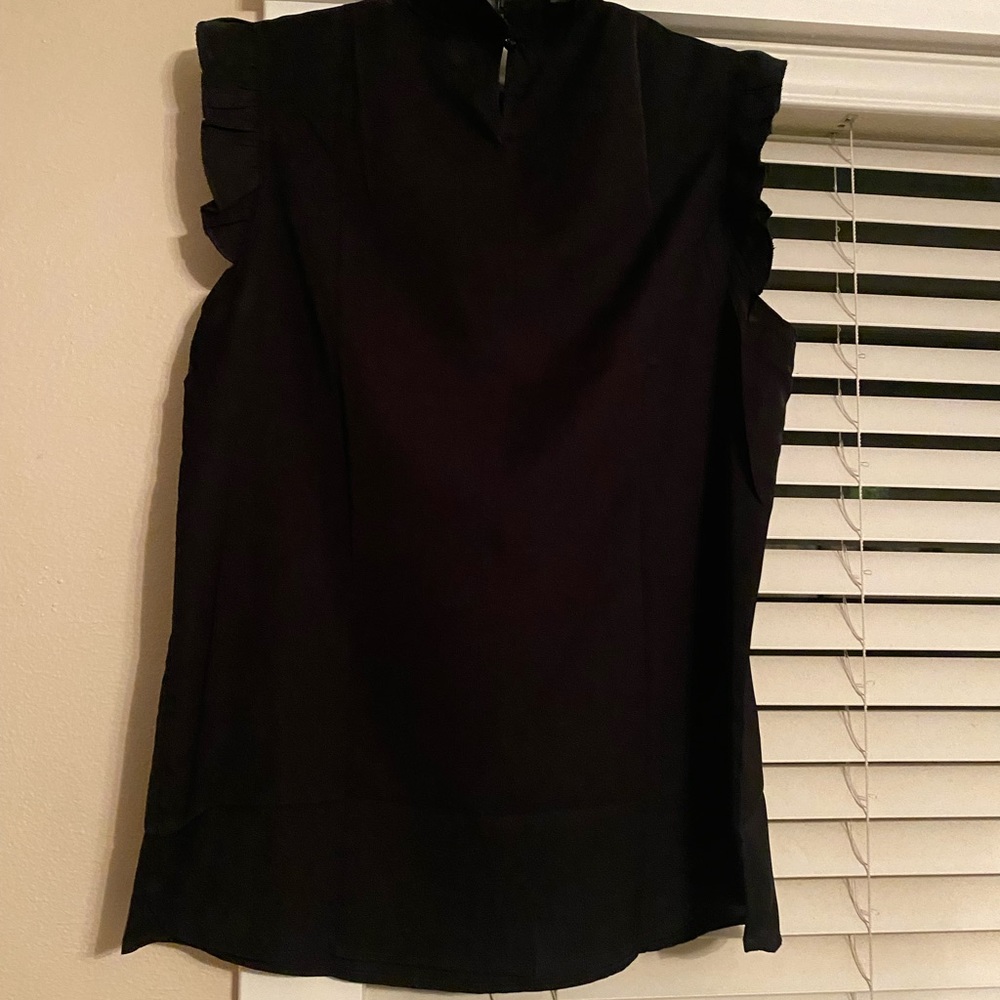 Polyester + Spandex. Halter Ruffle Trim Neckline ,Cap Sleeve,Pleated Front